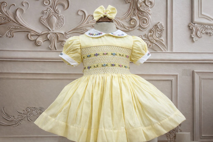 Lemon smock dress with pastel colour embroidery