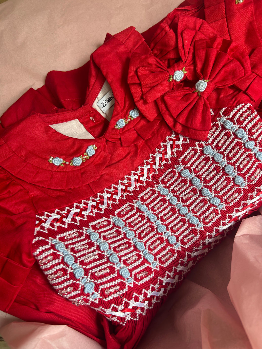 Red With baby blue smock & crystal details ( September delivery)