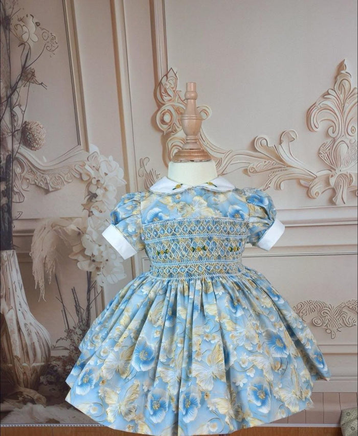 Exclusively blue/ gold 3d floral/butterfly fabric
