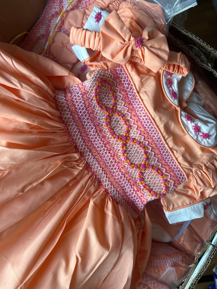 Orange with Bright pink smocking
