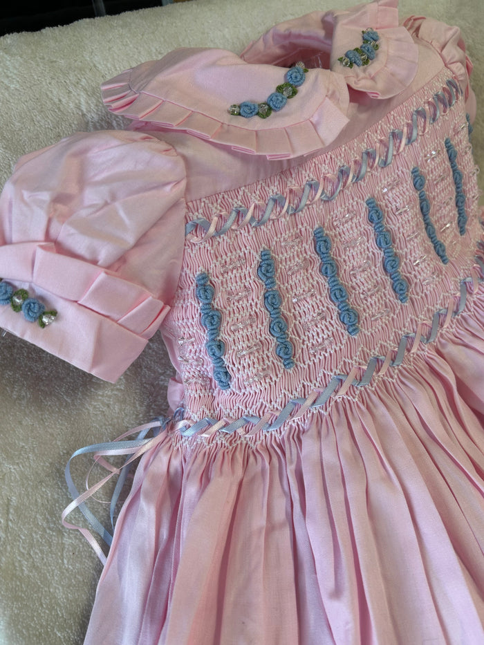 Pink with blue smocking
