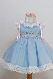 Blue plumetti with pink smocking