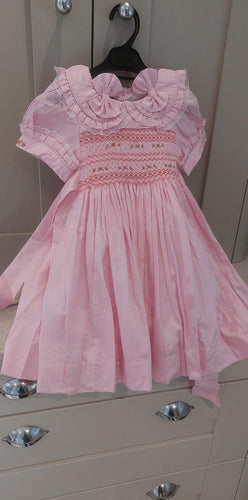 pink smock dress with 2 hairbows